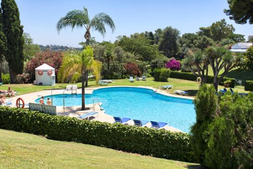 Exclusivo apartamento en entorno de golf con jardín y piscina